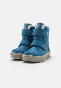 Blå vinterstøvler med beige tykke gummisåler, dobbel Velcro-lukning og blød lyserød pelsfor indeni.