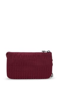 Portafoglio zippo bordeaux con un motivo testurizzato, forma rettangolare e accessori a contrasto. Superficie in tessuto liscia e bordi cuciti.