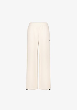 Off-white weite Fleece-Hosen mit elastischem Bund und verstellbaren Kordeln an den Bündchen, ausgestattet mit kleinem schwarzen Logo-Patch auf dem linken Oberschenkel.