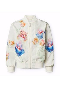 Vit bomberjacka med blommönster i rosa och blått. Har en framdragkedja, ribbade mudd och lätt material.