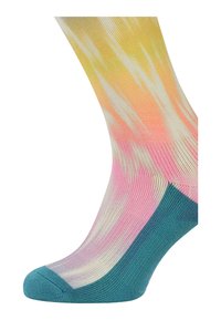 Monivärinen sukka, jossa on gradienttimalli, jossa on keltaista, pinkkiä ja valkoista. Turkoosi korostus kantapäässä ja varpaissa. Pehmeä, ribattu pinta.