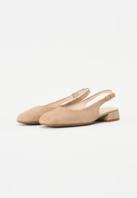 Beige suede slingback shoes with a rounded toe, modest block heel, and an adjustable strap detail. Smooth texture and simple design.
