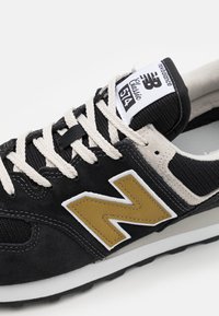 New Balance ML574 UNISEX - Sapatilhas - black
