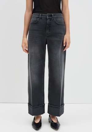 Wide-leg black denim jeans with a high waist, button closure, and rolled cuffs. Smooth texture with a faded finish.