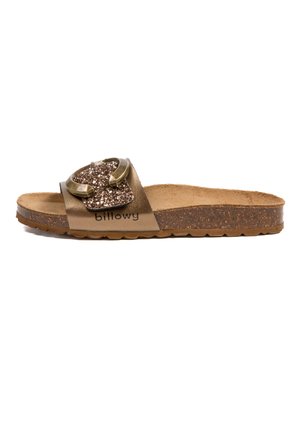 Sandale à glissière en faux cuir marron avec une grande boucle pailletée, semelle en liège et semelle en caoutchouc texturé avec un motif ondulé.