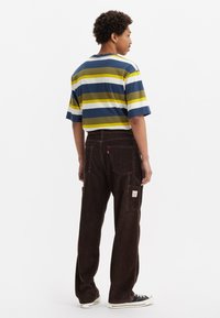 Levi's® Workwear CARPENTER UNISEX - Laisvi džinsai - black coffee