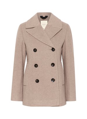 Double-breasted coat in soft beige wool, featuring a notched collar, large black buttons, and side pockets for function and style.