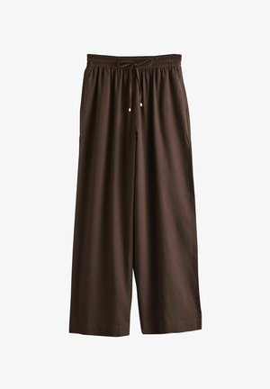 Pruunid laiad püksid elastse vöö ja nööriga, küljetaskutega, valmistatud pehmest ja kerge kangast.