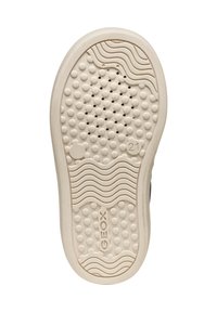 Geox skosula, beige gummi, mönstrad med små upphöjda prickar och spår för grepp, med ett runt hål för andningsförmåga, märkt med "21".