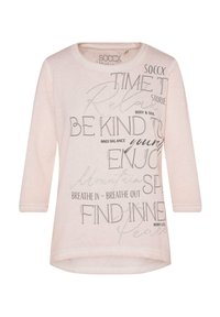 Maglietta a maniche lunghe di colore rosa chiaro, realizzata in tessuto morbido, con diverse scritte in grigio scuro e accenti di glitter argento, orlo arrotondato e colletto a girocollo.