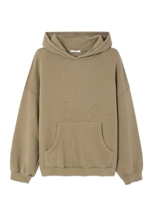 Sweat à capuche beige surdimensionné avec une poche kangourou à l'avant, des manches longues et une capuche, fabriqué en tissu doux et texturé.