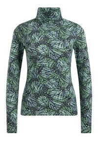 Grön, svart och blå polotröja med ett bladmönster; tillverkad av stretchtyg. Har långa ärmar och en figurnära design.