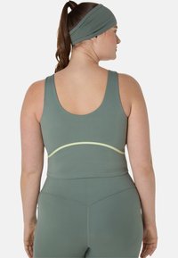 ASICS NAGINO FLEX - Reggiseno sportivo con sostegno medio - monument blue