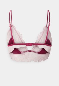 Bralette de renda em burgundy e rosa suave, com padrões florais, alças ajustáveis e um painel traseiro transparente com bordas em formato de ondas.