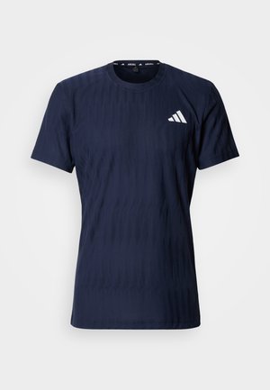 Navy blue short-sleeve shirt made of breathable fabric, featuring a textured pattern and a white logo on the left chest.