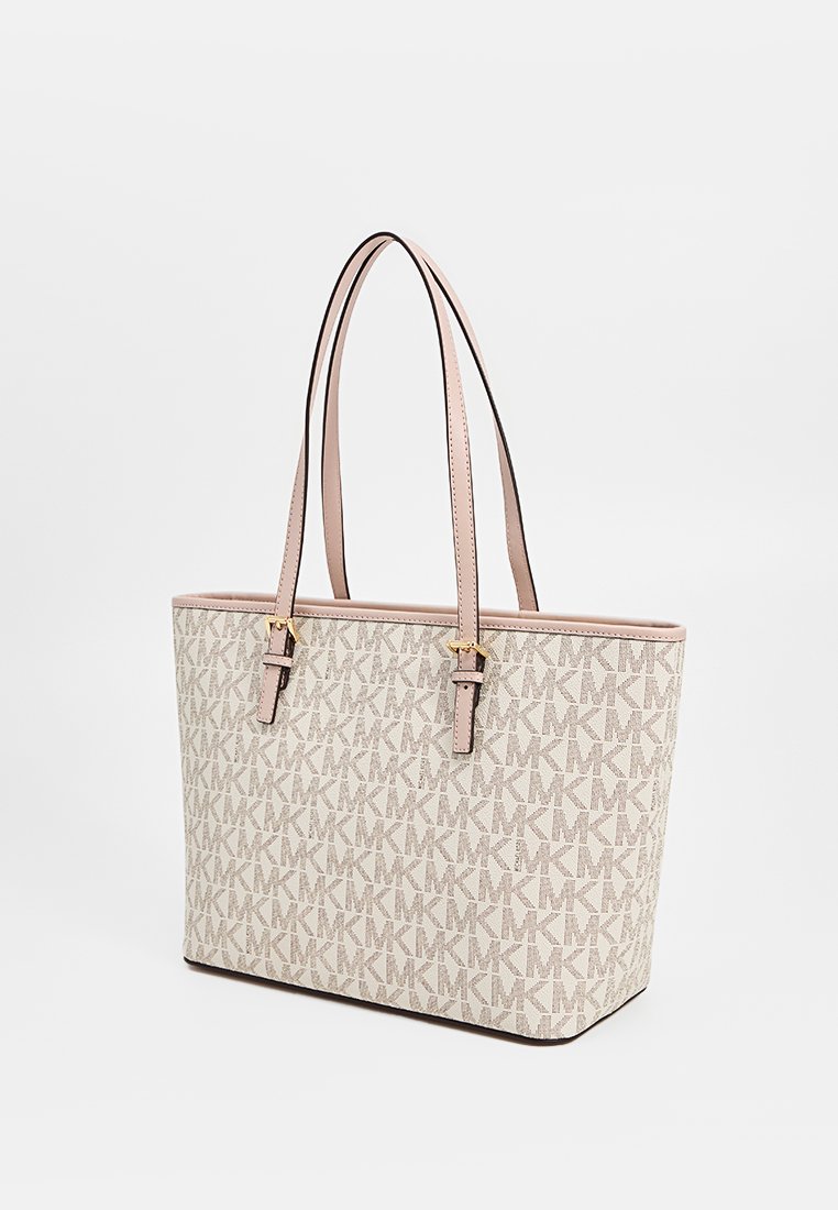 Tasche aus beige Monogramm-Muster mit sanften pinken Ledergriffen, strukturierter Form und goldenen Hardware-Details.