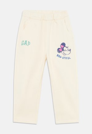 Pantaloni tuta color crema con cintura elastica, tasche laterali e stampe grafiche di un personaggio dei cartoni animati con il testo "BOW-UTIFUL."