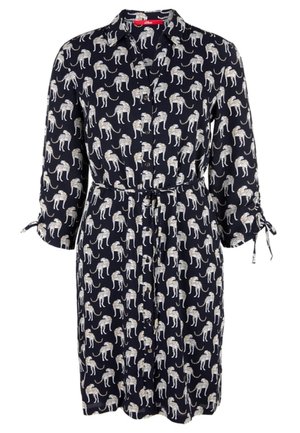 Black knee-length shirt dress with beige cheetah print, button front, waist tie, and 3/4 sleeves with tie details.