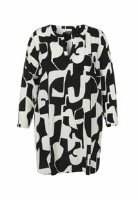 Zwart-witte tuniek met een geometrisch abstract patroon, met een V-hals en driekwartmouwen, gemaakt van lichtgewicht stof.