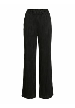 Pantalons larges noirs avec des lignes ondulées verticales texturées et une taille élastique, présentés sur un fond blanc.