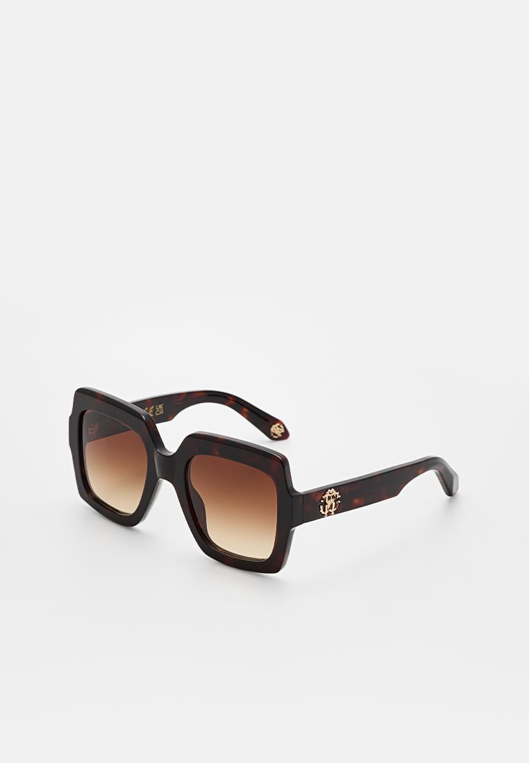 Large square sunglasses with a tortoiseshell frame, gradient brown lenses, and gold hardware accents on the temples.