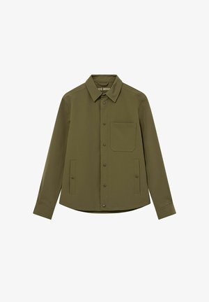 Õlivihmroheline pika varrukaga nööbitav särk kraega, ühe rinnatasku ja kahe küljetaskuga, mis on kinnitatud nööpidega.