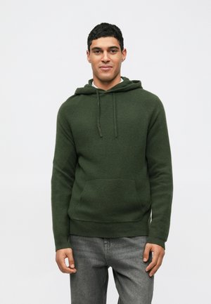 Donkergroene hoodie van zachte stof, met een voorkleinzak, trekkoordjes op de capuchon en geribbelde manchetten en onderkant. G Combination with grey jeans.