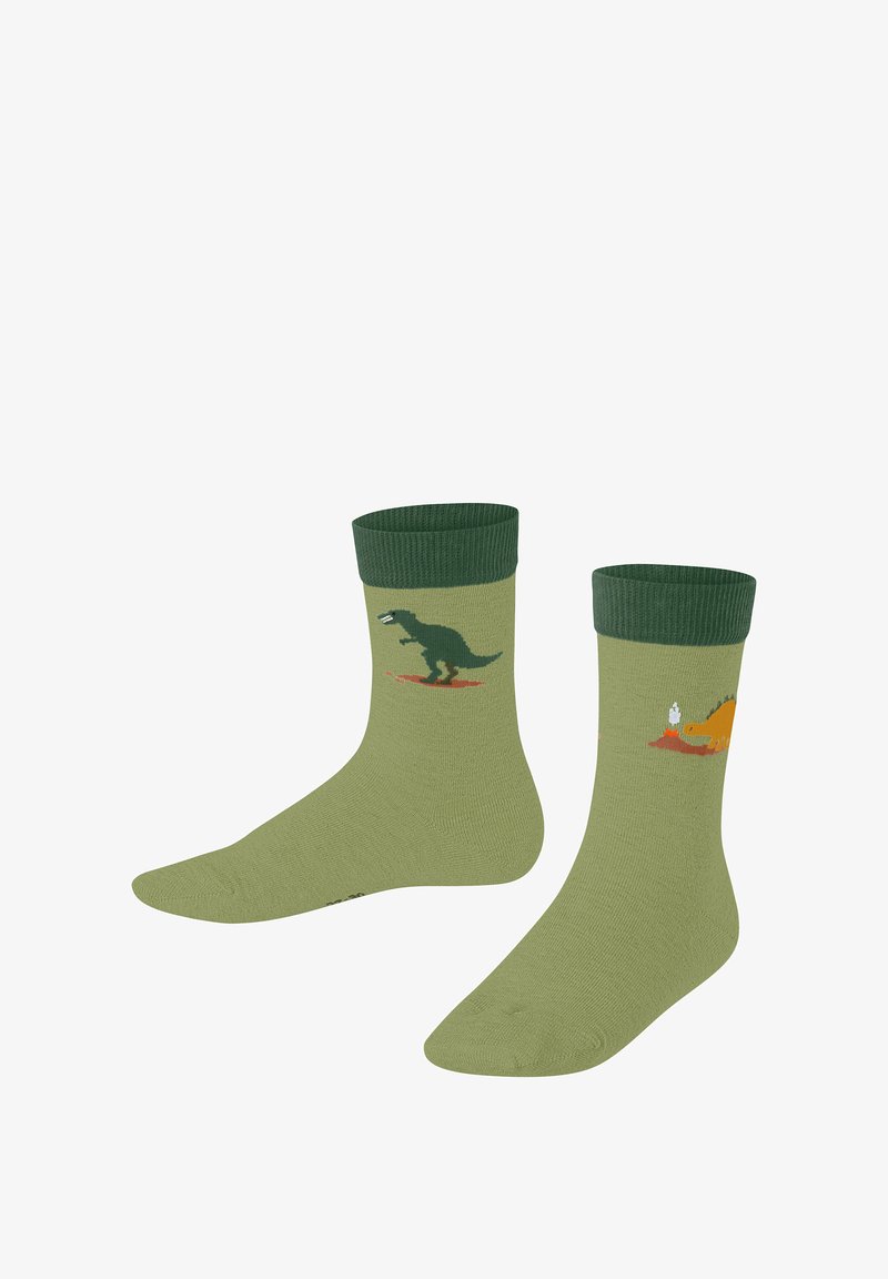 Grüne Socken mit einem Tyrannosaurus rex auf einer Socke und einem Cartoon-Dinosaurier mit einem kleinen Vulkan auf der anderen.