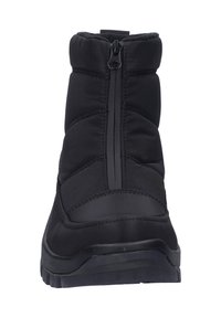 Botas aislantes negras con parte superior de nailon, cierre de cremallera, cuello acolchado y suela de goma texturizada. Presenta un diseño acolchado para mayor aislamiento.