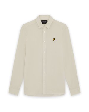 Beiges langärmeliges Hemd mit Knopfleiste, spitzem Kragen und kleinem gelbem Vogel-Logo auf der linken Brust.