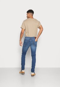 Pepe Jeans FINSBURY - Calças de ganga de corte skinny - denim