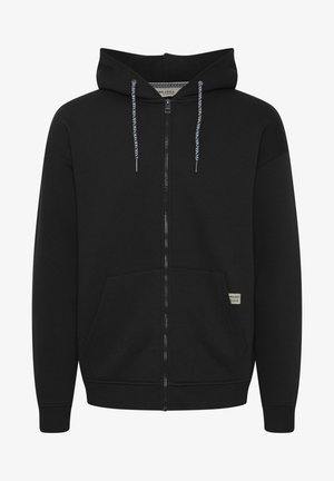 Musta tõmblukkidega kapuutsiga sviiter, mis on valmistatud puuvilla segust, varustatud nööriga kapuutsi, kahe eesmine tasku, soonikuga varrukad ja väike brändi silt.