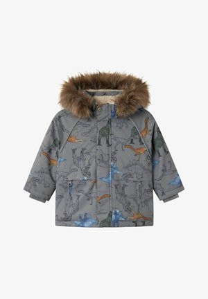 Veste rembourrée grise avec capuche en fausse fourrure, ornée d'imprimés de dinosaures colorés. Comprend deux poches à l'avant et des poignets côtelés pour plus de chaleur.