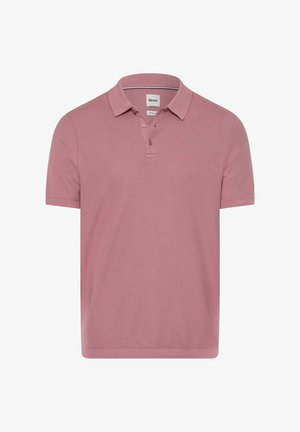 Polo shirt rosa a maniche corte con colletto e due bottoni, tessuto a maglia texturizzato, etichetta del marchio all'interno del colletto.
