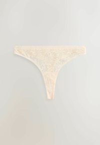 Tanga din dantelă de culoare crem deschis, cu model floral și textură transparentă. Prezintă bretele laterale subțiri și un design cu talie joasă și acoperire minimă.