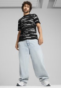 Puma MERCEDES-AMG PETRONAS F1® LOGO - T-shirt med print - black