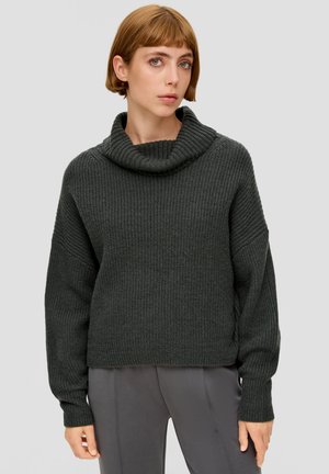 Donkergroen, chunky gebreid sweater met een omgeslagen kraag, verlaagde schouders en geribbelde mouwen. Zachte textuur met een losse pasvorm.