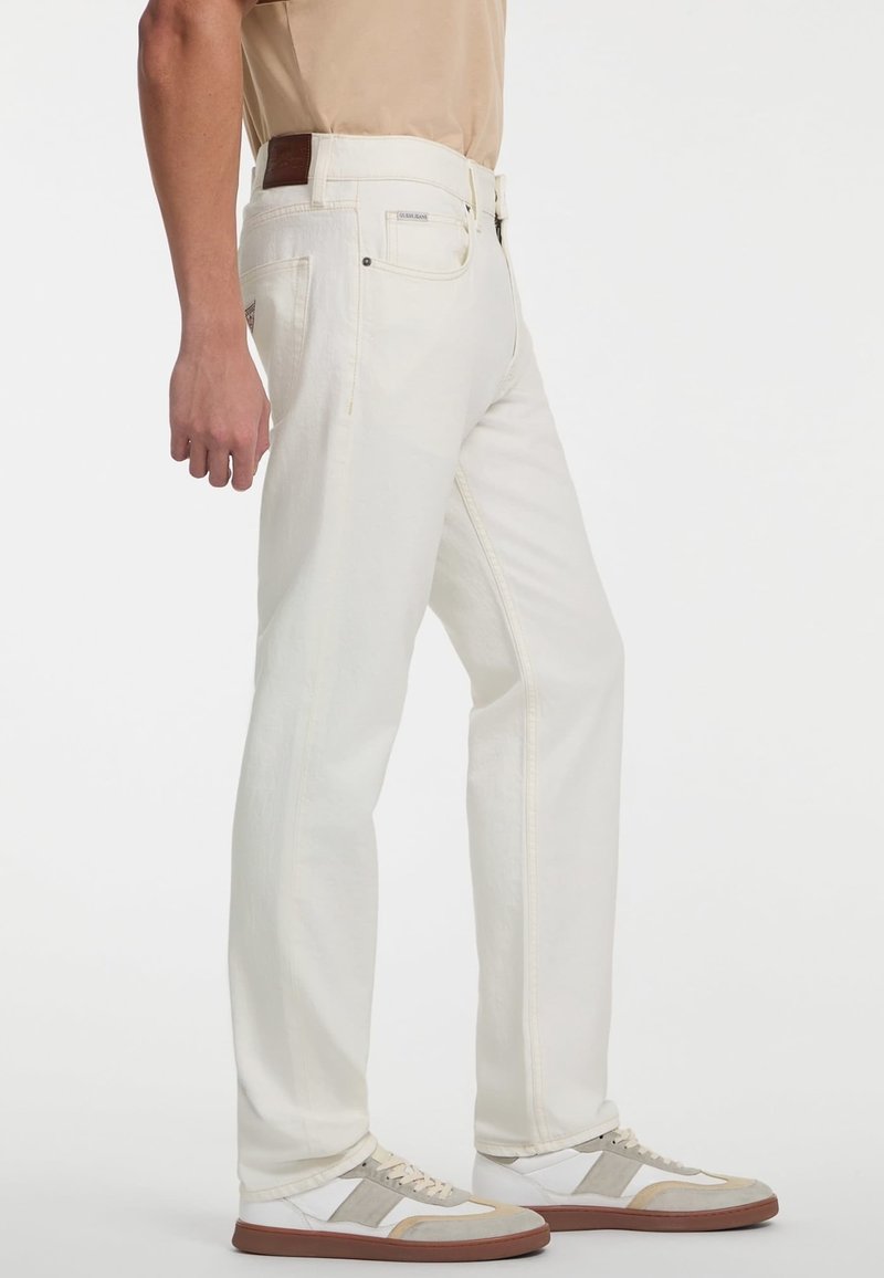 Jean GUESS Vintage Blanc Femme - Taille 29, Longueur 30 - Style Ourlet Vieilli Et Poches - Très Bon état Occasion