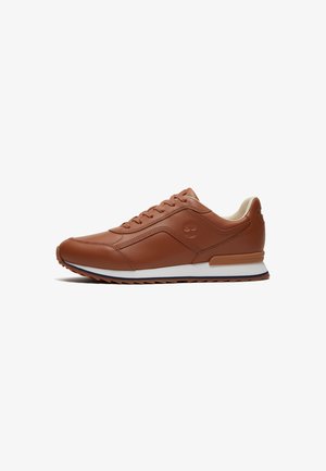Brown leather sneaker with white sole and lace-up design, featuring a subtle embossed logo on the side.