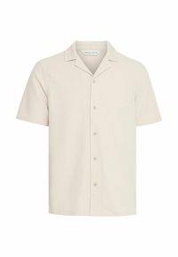 Camisa de manga corta en tejido de canalé color beige claro. Cuenta con un collar puntiagudo y seis botones en la parte delantera. Dobladillo recto y ajuste relajado.