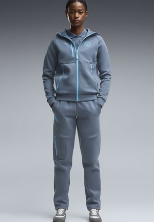 Puma, MANCHESTER CITY PUMATECH JOGGINGHOSE - Pantalon de survêtement - evening sky-luminous blue