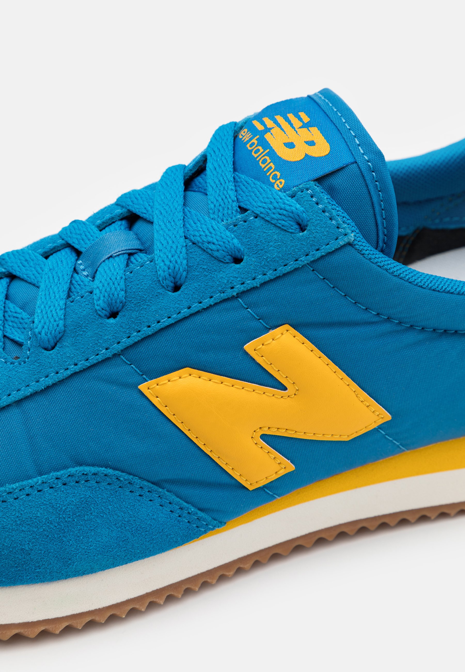new balance yellow blue