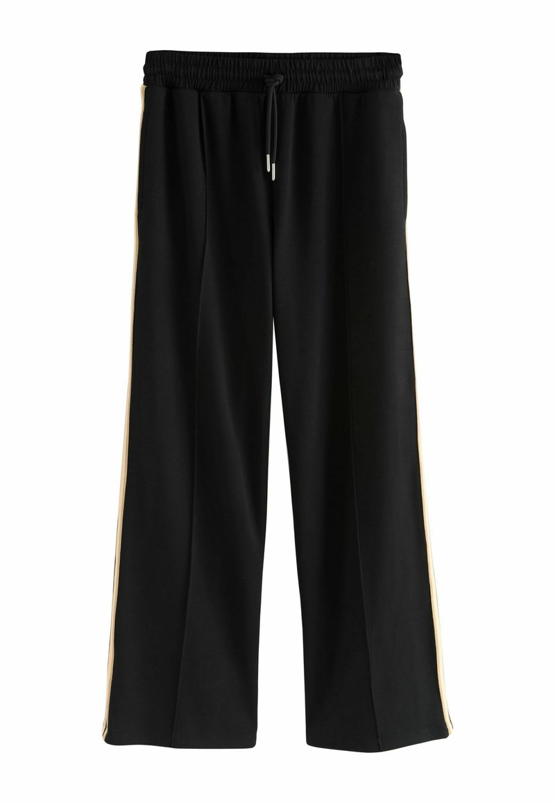 Schwarze weit geschnittene Hose mit einem elastischen Bund, ausgestattet mit einem goldenen Seitenstreifen und glattem Stoff. Mit Kordelzug ausgestattet.