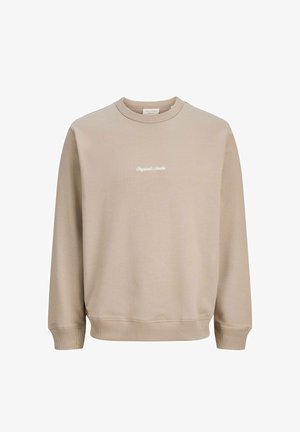 Sweatshirt beige avec un col rond et des poignets côtelés. Présente un texte blanc subtil à l'avant. Tissu doux avec une texture lisse.