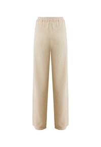 Pantalons larges beiges avec une taille élastique, deux poches arrière et une texture lisse, offrant une coupe décontractée et sans fermetures visibles.