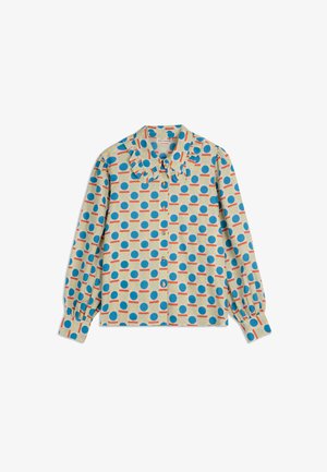 Camicia a maniche lunghe con colletto arricciato, caratterizzata da un motivo geometrico colorato di cerchi blu e quadrati gialli su un tessuto beige.