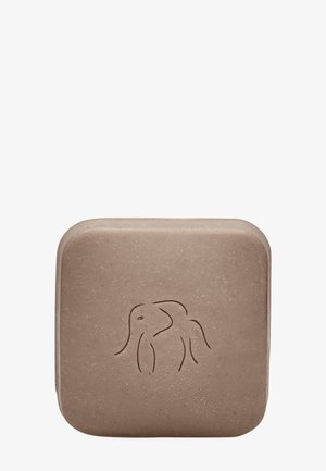 Brown square soap with rounded edges, featuring a raised elephant design on the front. Made from natural materials, textured surface.