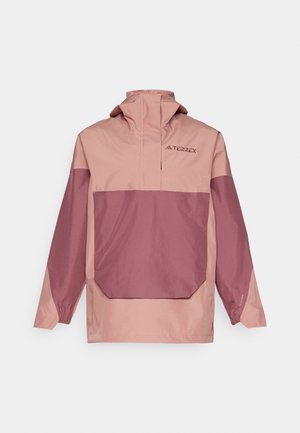 Giacca leggera a pullover bicolore in rosa e malva. Presenta un alto collo, una tasca frontale e polsini elastici per una vestibilità aderente.