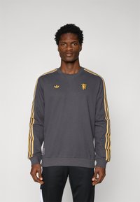 adidas Originals MANCHESTER UNITED ICON - Klub merchandise - utility black