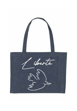 Sac en denim de couleur bleu foncé avec deux longues poignées, featuring le texte imprimé en blanc "Liberté" et un graphique de colombe. Texture lisse, forme rectangulaire.